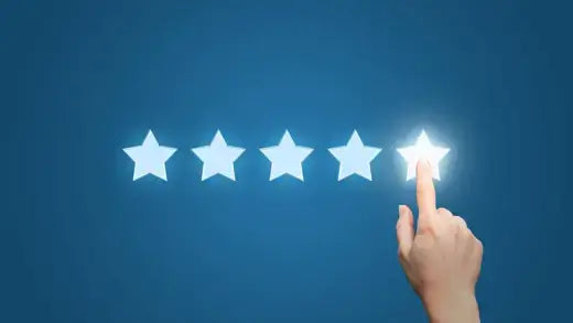 Hand tapping glowing star on rating scale for Tennessee Wholesale Nursery reviews