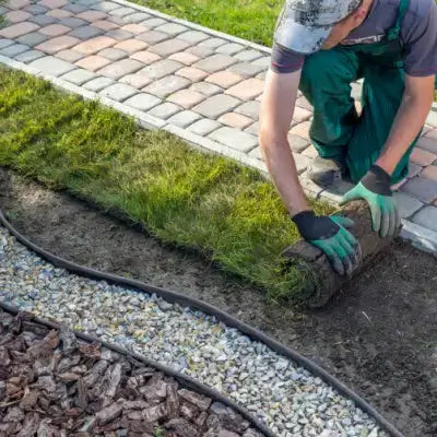 Rolled-up green sod lawn neatly wrapped for easy installation