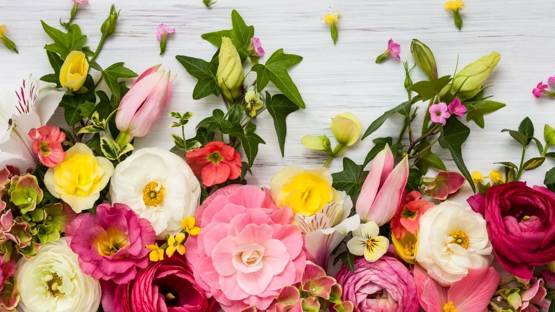 Vibrant fragrant bouquet of pink, white, yellow, red flowers with greenery