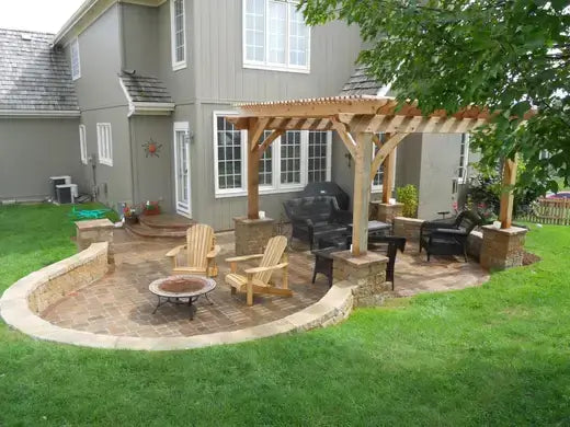 Wooden pergola with natural finish on stone pillars in patio design