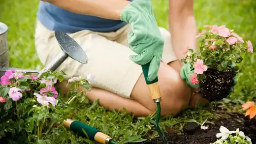 Green gardening gloves with wooden handle grip for beginners
