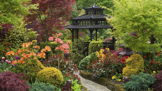 Black wooden pagoda with tiered roof and intricate latticework