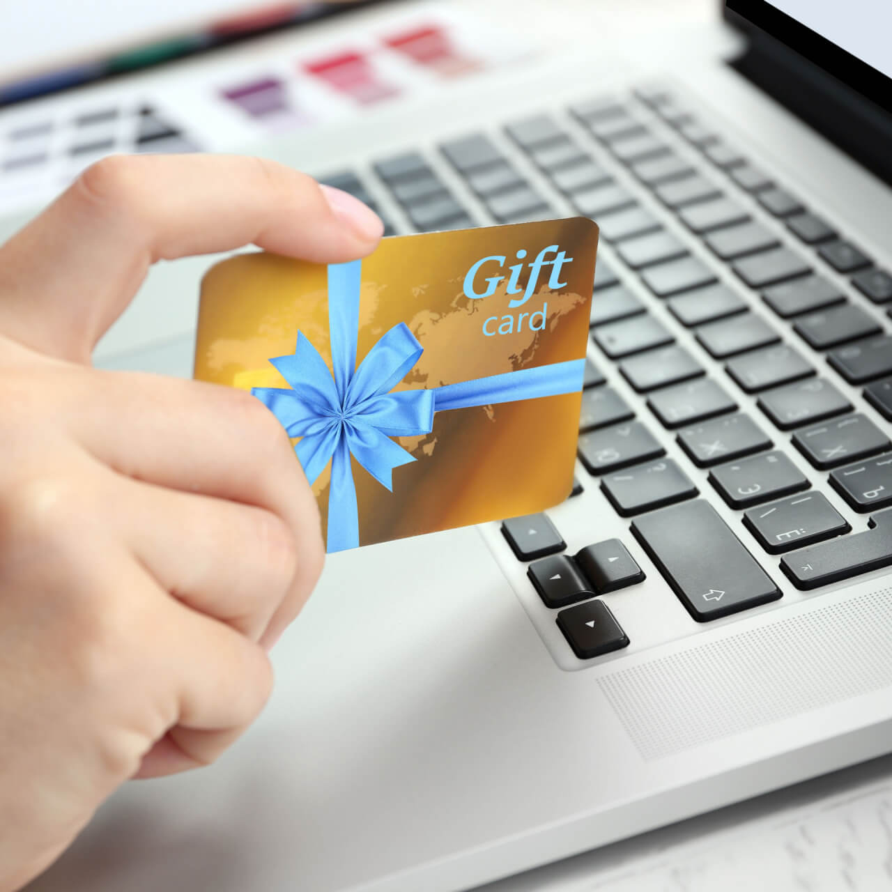 Golden Digital Gift Card with blue ribbon bow